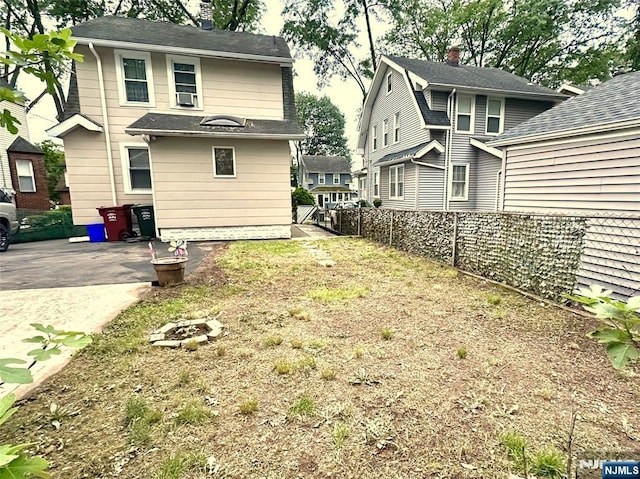 128 Oak Ridge Ave, Nutley, NJ 07110 - rear view of property featuring a chimney