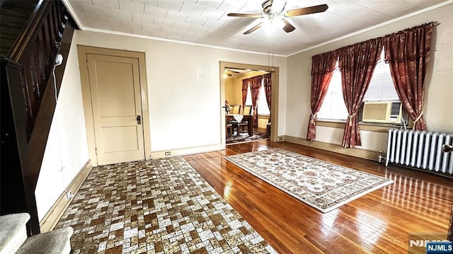 128 Oak Ridge Ave, Nutley, NJ 07110 - bedroom with radiator heating unit, crown molding, hardwood / wood-style flooring, and baseboards