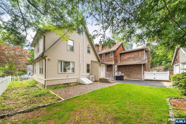 93 Stelfox St, Demarest, NJ 07627 - rear view of house with a gate