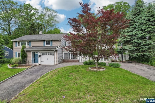 26 Howard Pl, Waldwick, NJ 07463 - view of front of home featuring asphalt driveway and a chimney