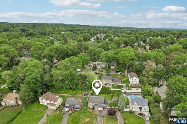 26 Howard Pl, Waldwick, NJ 07463 - aerial view of property and surrounding area featuring a heavily wooded area and nearby suburban area