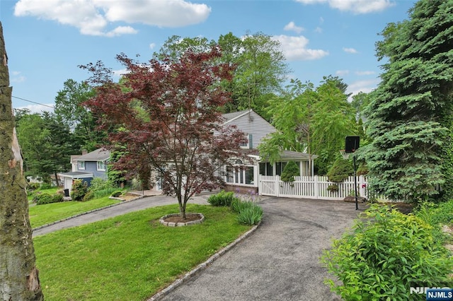 26 Howard Pl, Waldwick, NJ 07463 - obstructed view of property featuring asphalt driveway