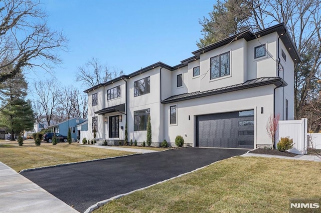 623 Alberta Dr, Paramus, NJ 07652 - contemporary house with a standing seam roof, a garage, asphalt driveway, metal roof, and stucco siding