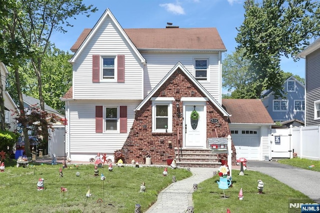 1154 Summit Ave, Teaneck, NJ 07666 - view of front of house featuring driveway and an attached garage