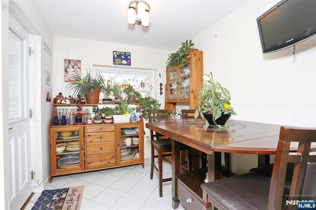 1154 Summit Ave, Teaneck, NJ 07666 - dining space featuring light tile patterned floors
