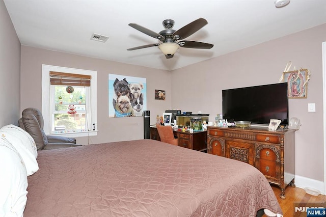 1154 Summit Ave, Teaneck, NJ 07666 - bedroom with wood finished floors, ceiling fan, and baseboards