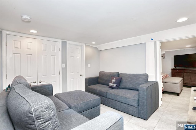 1154 Summit Ave, Teaneck, NJ 07666 - living room with light tile patterned floors and recessed lighting