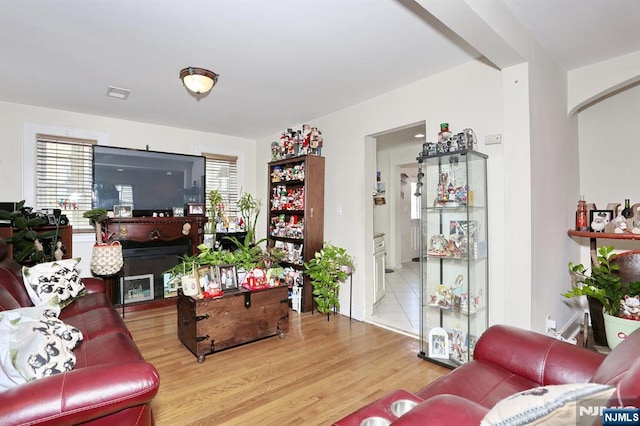 1154 Summit Ave, Teaneck, NJ 07666 - living area featuring wood finished floors and healthy amount of natural light