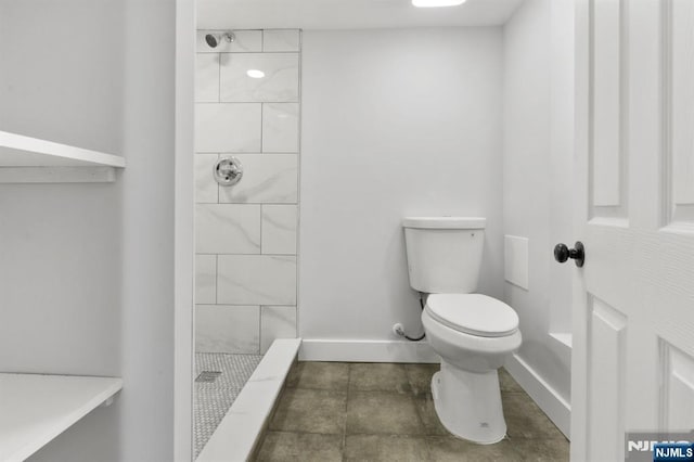49 Oakwood Ave, Bloomfield, NJ 07003 - full bathroom with toilet, a stall shower, and baseboards