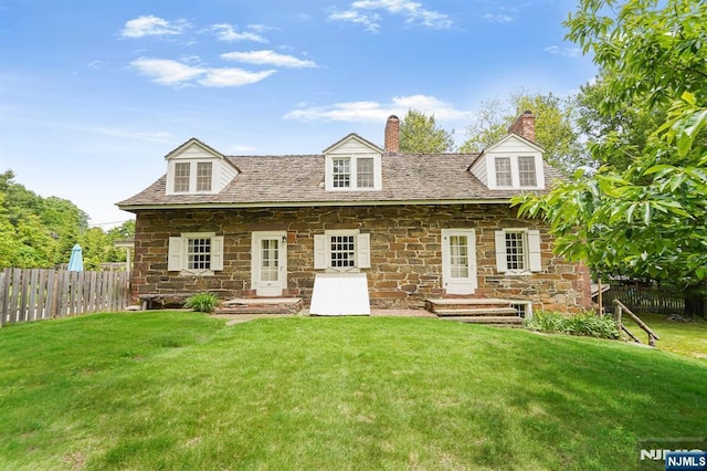 58 Maple Ave, Montville Township, NJ 07058 - rear view of house featuring stone siding and a chimney