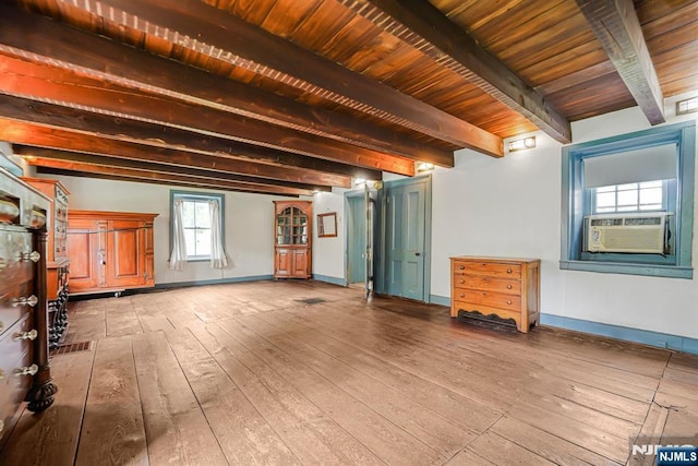 58 Maple Ave, Montville Township, NJ 07058 - unfurnished living room featuring light wood-style flooring, baseboards, cooling unit, and wood ceiling with exposed beams