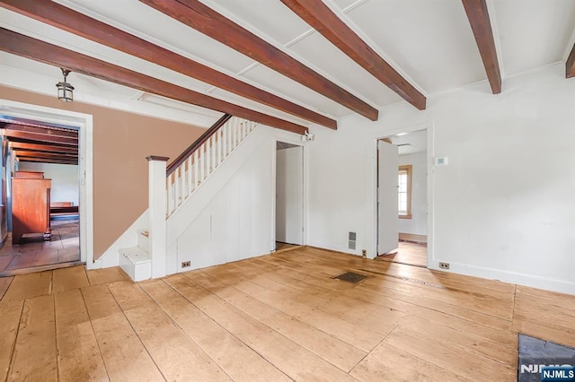 58 Maple Ave, Montville Township, NJ 07058 - unfurnished living room featuring hardwood / wood-style floors, stairway, and beam ceiling