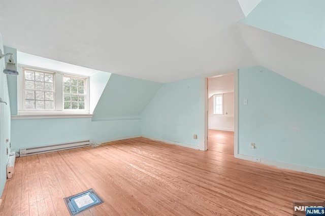 58 Maple Ave, Montville Township, NJ 07058 - bonus room featuring a baseboard radiator, wood finished floors, lofted ceiling, and baseboards