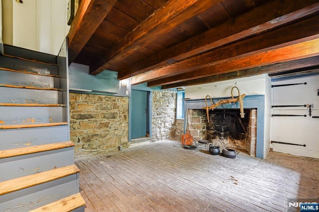 58 Maple Ave, Montville Township, NJ 07058 - unfurnished living room featuring a fireplace and wood ceiling with exposed beams