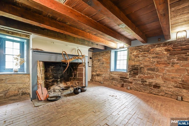 58 Maple Ave, Montville Township, NJ 07058 - living area featuring wood ceiling with exposed beams and a fireplace