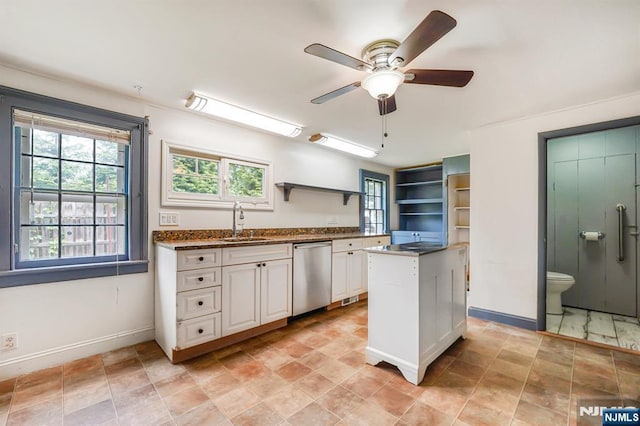 58 Maple Ave, Montville Township, NJ 07058 - kitchen featuring dishwasher, a sink, open shelves, and healthy amount of natural light