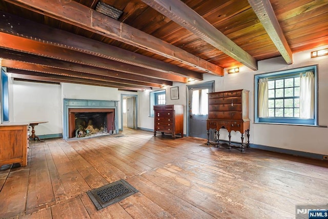 58 Maple Ave, Montville Township, NJ 07058 - living room featuring hardwood / wood-style flooring, wood ceiling with exposed beams, a fireplace, and baseboards