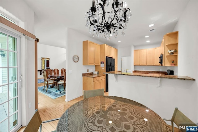 8 Pine Lake Ter Unit T008, River Vale, NJ 07675 - kitchen featuring light brown cabinetry, black refrigerator with ice dispenser, open shelves, dark stone counters, and a chandelier