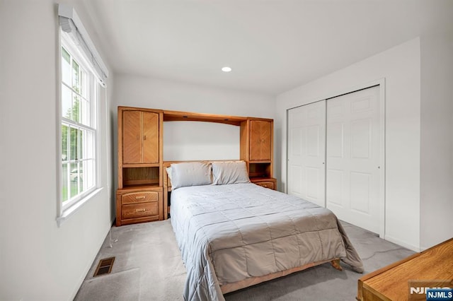 8 Pine Lake Ter Unit T008, River Vale, NJ 07675 - bedroom featuring light carpet, multiple windows, a closet, baseboards, and recessed lighting