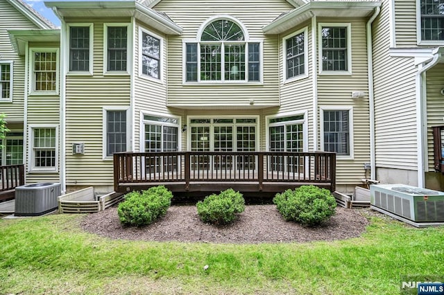 8 Pine Lake Ter Unit T008, River Vale, NJ 07675 - back of house featuring cooling unit, a wooden deck, and a yard