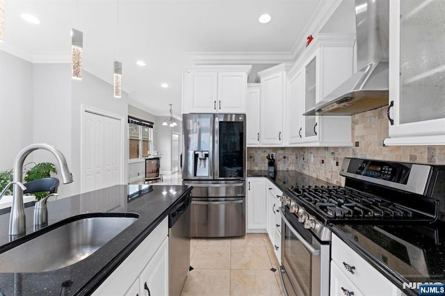 52 Myrtle Ave Unit B, Edgewater, NJ 07020 - kitchen with stainless steel appliances, wall chimney exhaust hood, a sink, tasteful backsplash, and white cabinetry