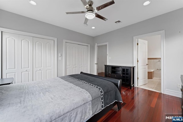 52 Myrtle Ave Unit B, Edgewater, NJ 07020 - bedroom with multiple closets, hardwood / wood-style flooring, recessed lighting, baseboards, and ensuite bathroom