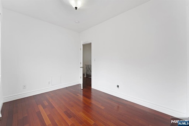 52 Myrtle Ave Unit B, Edgewater, NJ 07020 - spare room featuring baseboards and wood-type flooring