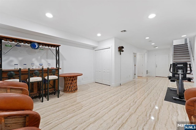 52 Myrtle Ave Unit B, Edgewater, NJ 07020 - indoor dry bar with recessed lighting, stairway, wood finished floors, and baseboards