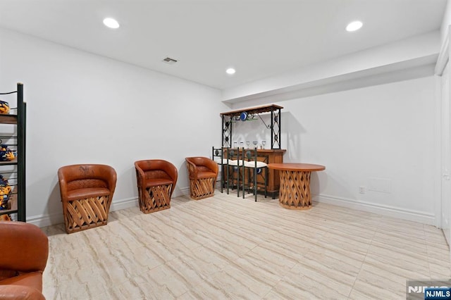 52 Myrtle Ave Unit B, Edgewater, NJ 07020 - living area with a bar, recessed lighting, and baseboards