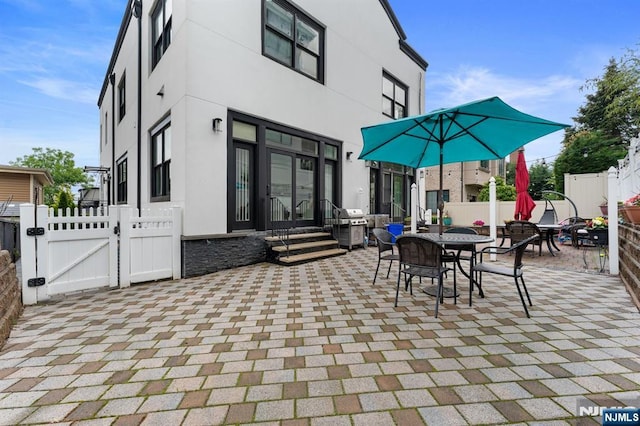 52 Myrtle Ave Unit B, Edgewater, NJ 07020 - view of patio / terrace featuring a gate and a grill