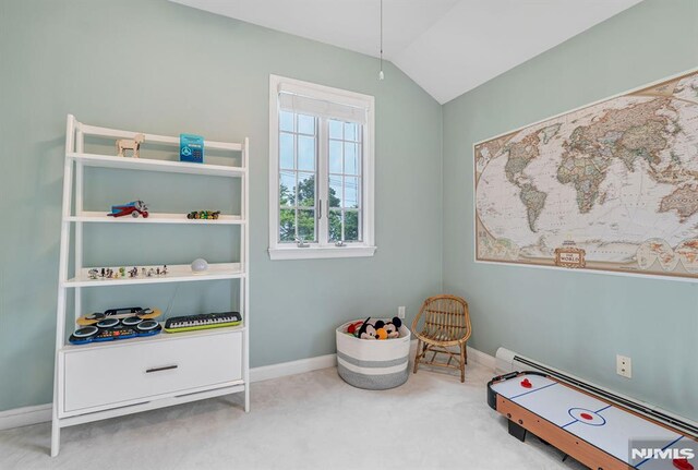 173 Sheridan Ave, Ho-Ho-Kus, NJ 07423 - recreation room with lofted ceiling, carpet floors, and baseboards