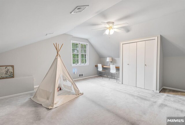 173 Sheridan Ave, Ho-Ho-Kus, NJ 07423 - rec room featuring lofted ceiling, ceiling fan, baseboards, and carpet