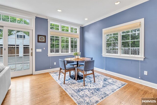 173 Sheridan Ave, Ho-Ho-Kus, NJ 07423 - dining space featuring ornamental molding, plenty of natural light, baseboards, wood finished floors, and recessed lighting