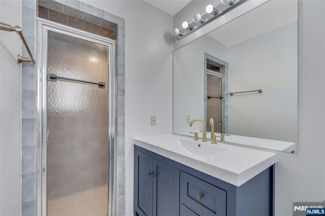 2410 3rd St, Fort Lee, NJ 07024 - bathroom featuring a stall shower and vanity