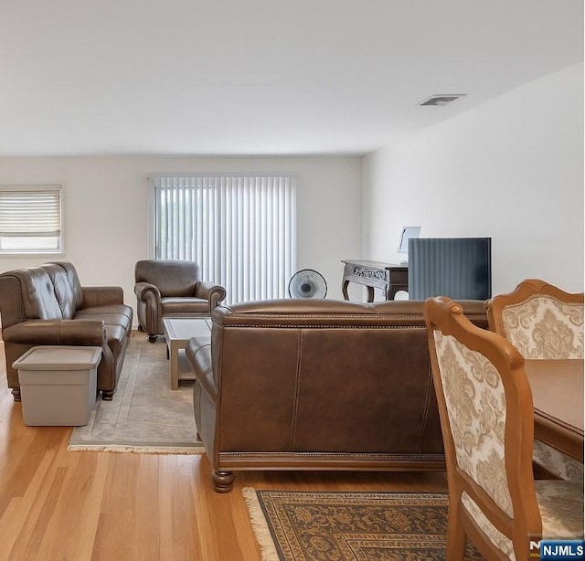 2410 3rd St, Fort Lee, NJ 07024 - living room featuring light wood-style floors
