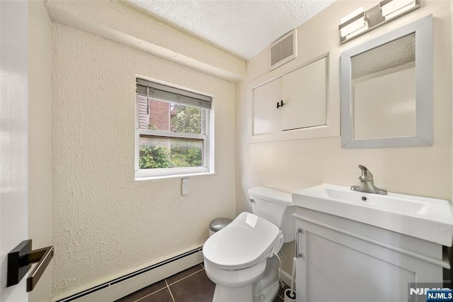 344 Northwood Way, Palisades Park, NJ 07650 - half bath featuring a baseboard radiator, a textured wall, vanity, toilet, and tile patterned floors