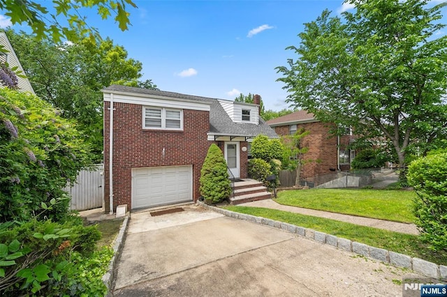 344 Northwood Way, Palisades Park, NJ 07650 - tri-level home with concrete driveway, a garage, brick siding, a shingled roof, and a chimney