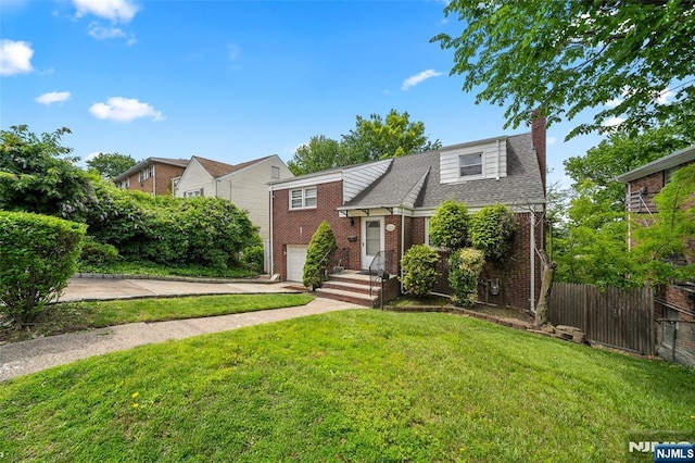 344 Northwood Way, Palisades Park, NJ 07650 - view of front facade with concrete driveway, a chimney, brick siding, an attached garage, and roof with shingles