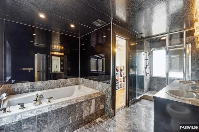 45 Longridge Rd, Montvale, NJ 07645 - bathroom with a tub with jets, a shower stall, double vanity, and marble finish floors