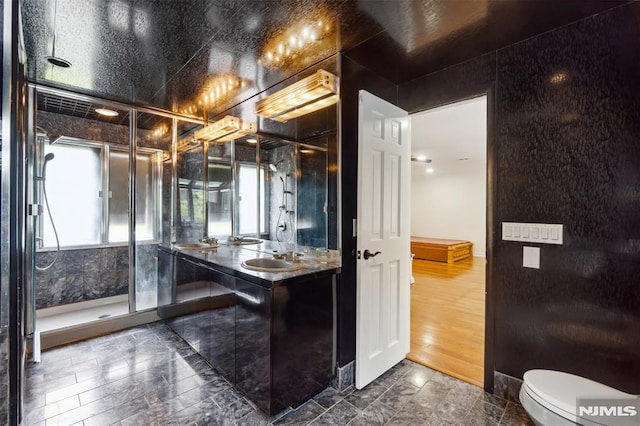 45 Longridge Rd, Montvale, NJ 07645 - bathroom featuring a stall shower, double vanity, and toilet
