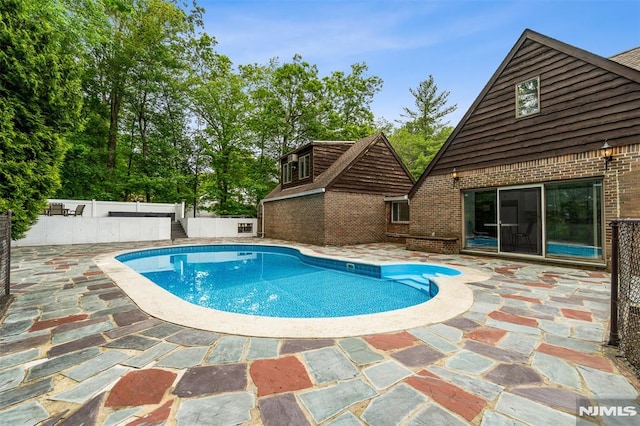 45 Longridge Rd, Montvale, NJ 07645 - view of swimming pool featuring a patio area and a fenced backyard