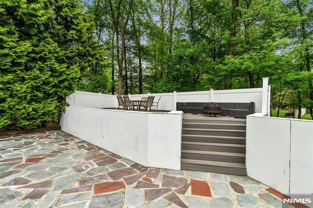 45 Longridge Rd, Montvale, NJ 07645 - view of patio with outdoor dining space, a fire pit, and view of scattered trees