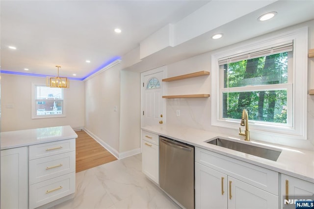 112 Fern St, Twp Of Washington, NJ 07676 - kitchen featuring stainless steel dishwasher, a sink, light marble finish flooring, a chandelier, and white cabinets