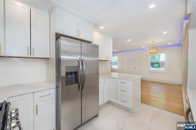 112 Fern St, Twp Of Washington, NJ 07676 - kitchen with stainless steel appliances, light countertops, a peninsula, white cabinetry, and recessed lighting