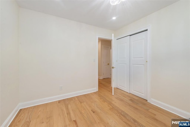 112 Fern St, Twp Of Washington, NJ 07676 - unfurnished bedroom with light wood-type flooring, baseboards, a closet, and recessed lighting