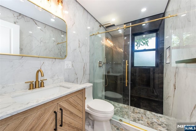 112 Fern St, Twp Of Washington, NJ 07676 - full bath featuring tile walls, vanity, toilet, and a marble finish shower