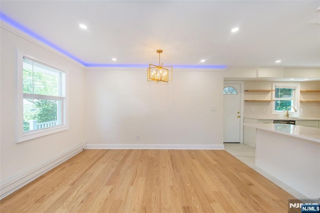 112 Fern St, Twp Of Washington, NJ 07676 - unfurnished dining area featuring a chandelier, light wood-type flooring, baseboards, ornamental molding, and recessed lighting