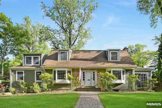 68 Birch St, Ramsey, NJ 07446 - view of front of property featuring a chimney, a front lawn, and stone siding