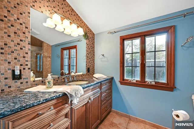 68 Birch St, Ramsey, NJ 07446 - bathroom featuring lofted ceiling, tile patterned flooring, vanity, toilet, and baseboards