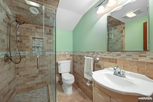 68 Birch St, Ramsey, NJ 07446 - full bathroom with toilet, vanity, a stall shower, tile walls, and a wainscoted wall